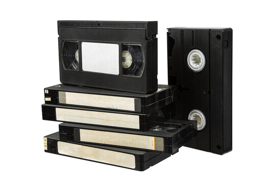 A stack of vintage VHS tapes on a transparent background