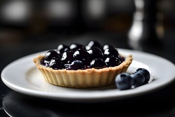 Tarte aux myrtilles. Close-up of a blueberry tart with softened, pasty topping on a white plate, dark countertop, soft lighting, and decorative blueberries