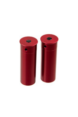 Two red 12-gauge dummy shotgun shells for safe dry firing, isolated on a white back