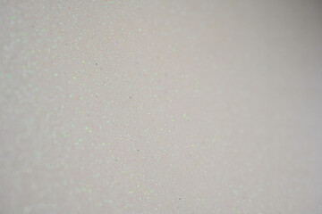 Subtle Iridescent Glitter Texture Background. A soft and muted iridescent glitter texture with delicate shimmering hues, perfect for elegant backgrounds and minimalist designs.

