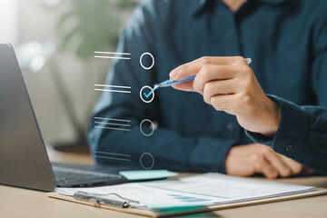 check, document, checklist, choice, guarantee, answer, assurance, certificate, choose, list. A person is using a pen to check off items. as the person is actively working through a list or checklist.