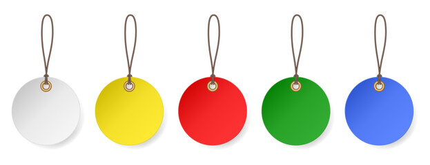 Set of round hanging labels. White, yellow, red, green and blue gift tags. Cardboard tags with hole and rope