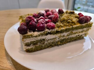 Cottage cheese sponge cake with cranberries on a plate. High quality photos