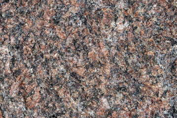 Brown granite stone texture, background.