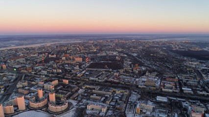 Fototapeta premium Cityscape with a beautiful sunset in the background