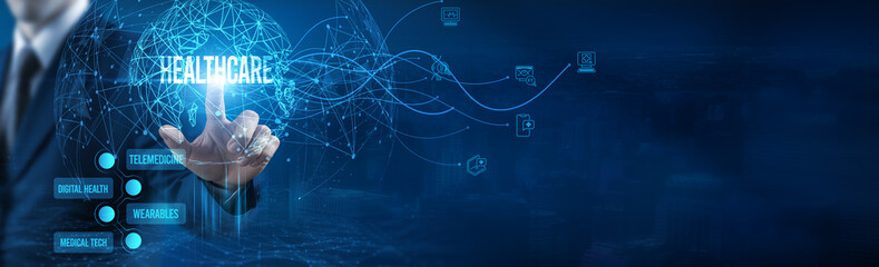 Businessman touching healthcare icon on virtual interface, medical technology, digital health, healthcare solutions, patient care management, health information systems, telemedicine services.