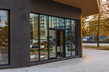 Photo of the mall shopping street in Europe. Exterior of a new shopping center building. © Elena_Alex