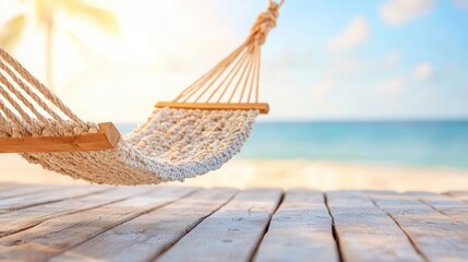 Fototapeta premium A serene hammock sways gently on a wooden deck, overlooking a calm beach with soft waves and a bright, sunny sky.