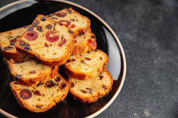 Fruit cake dessert sweet dried fruit traditional pastry, nuts meal food snack on the table copy space food background rustic top view