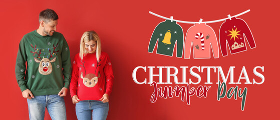 Happy couple in Christmas sweaters on color background