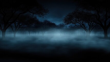 Fototapeta premium Mysterious Foggy Landscape with Silhouetted Trees at Night