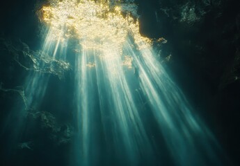 Obraz premium Sunlight Streams Through Water Surface in a Serene Cave Creating a Magical Underwater Scene with Ethereal Light Rays and Breathtaking Reflections