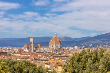 Fototapeta premium Florence city, Firenze architecture in Italy. Santa Maria del Fiore Cathedral, Duomo huge domes and walls as part of night cityscape from the hill above the city
