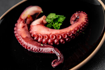 Octopus food seafood octopus tentacles fresh tasty food dish pescetarianism delicious gourmet food background on the table rustic food top view copy space keto and paleo diet