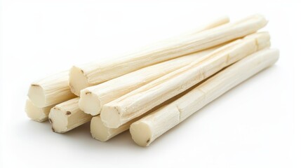  a pile of white sugarcane sticks on a white background The sticks are arranged in a neat pile, with some of them overlapping each other The white color of the sti