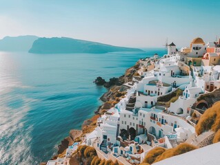 Naklejka premium Serene Seascape: Panoramic View of Whitewashed Church and Coastal Town