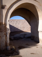 Arched entrance to street in the Medina district of Marrakech for use as a background