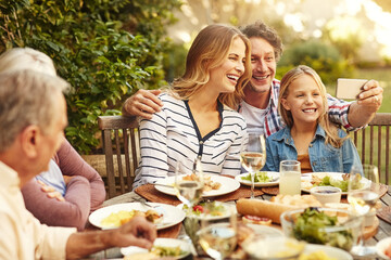 Lunch, garden and selfie of parents with child for holiday, vacation and festive season. Christmas, Thanksgiving and family with kid take picture for memory at celebration, dinner party and meal