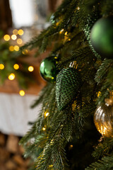 Christmas tree decorated with lights and balls. Bokeh