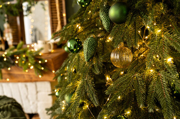 Christmas tree decorated with lights and balls. Bokeh