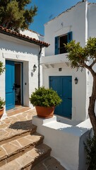 Fototapeta premium Charming white houses with blue details reflecting Mediterranean architecture.