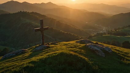 Christian cross on a green mountain, bathed in the warm glow of sunset.