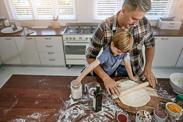 Above father, son and cooking help in kitchen for teaching with pizza, toppings and instructions for dinner. Family, man and child with preparation in home with salami, mushrooms and rolling dough