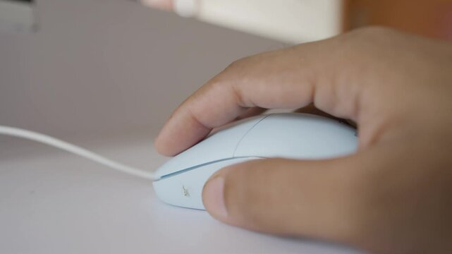 Computer mouse click by people hand