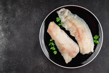 Raw fish fillet fresh tasty food dish delicious gourmet food background on the table rustic food top view copy space keto and paleo diet pescetarian
