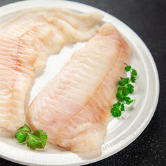 Raw fish fillet fresh tasty food dish delicious gourmet food background on the table rustic food top view copy space keto and paleo diet pescetarian