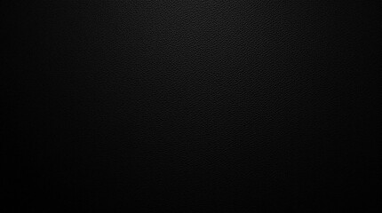 A plain, dark gray or black surface with subtle shading.

