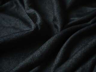 Obraz premium Close-up of flowing black fabric creating depth and movement.