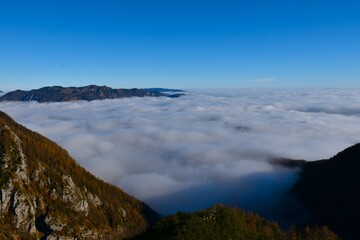 Cloud covered landscape bello Krvavec and Velika Planina in Slovenia