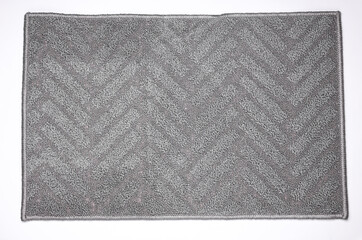 Fototapeta premium Gray bath rug on white background