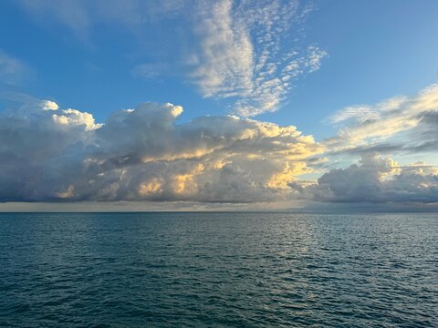 Dramatic sky clouds over sea 