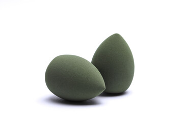 Eggs makeup sponges. Blenders for foundation on white background