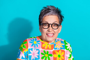 Portrait of nice aged lady grinning teeth wear t-shirt isolated on turquoise color background