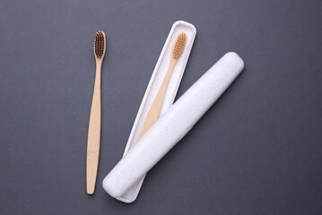 White plastic case with toothbrushes close-up