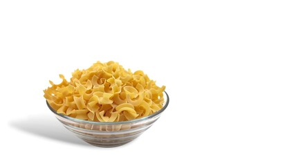 Photo of a glass bowl filled with uncooked hilopites (traditional Greek pasta), isolated on white background with space for text, ideal for culinary presentations.