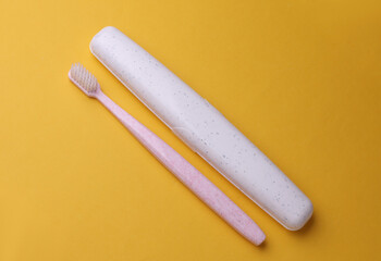 White plastic case for storing toothbrush