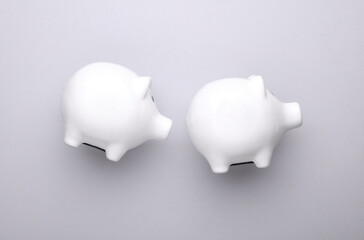 white ceramic piggy bank. Business concept. Conceptual photo. Top view. Flat lay