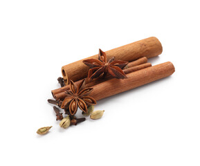 Different aromatic spices isolated on white. Christmas season