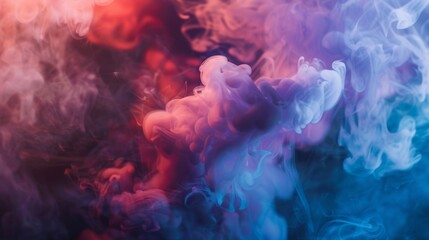 Fototapeta premium Abstract swirls of colorful smoke in pink and blue hues