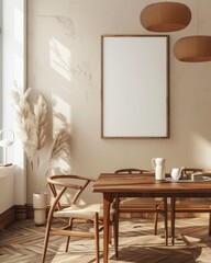 A minimalist dining room with a wooden table and chairs. a large framed poster. and a vase of dried flowers Sunlight streams through the window