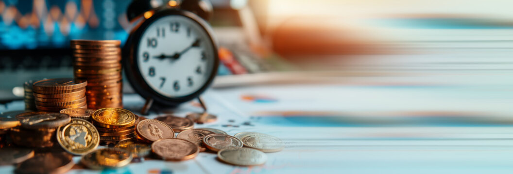 debt collection and tax season concept with deadline remind note, coins, banks, calculator on table, background, time to pay concept.