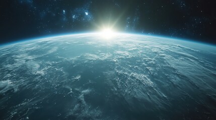 Fototapeta premium A breathtaking view of Earth from space, showcasing the sun rising over the horizon, illuminating the clouds, and revealing the vast beauty of our planet amidst the cosmos.