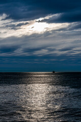 Seascape. Stormy sky over the sea on an autumn morning.	