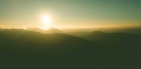 Serene mountain sunrise landscape