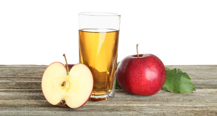 Tasty apple juice in glass and fresh fruits on wooden table against white background