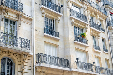 Obraz premium Paris, France. Old building facade with balconies.